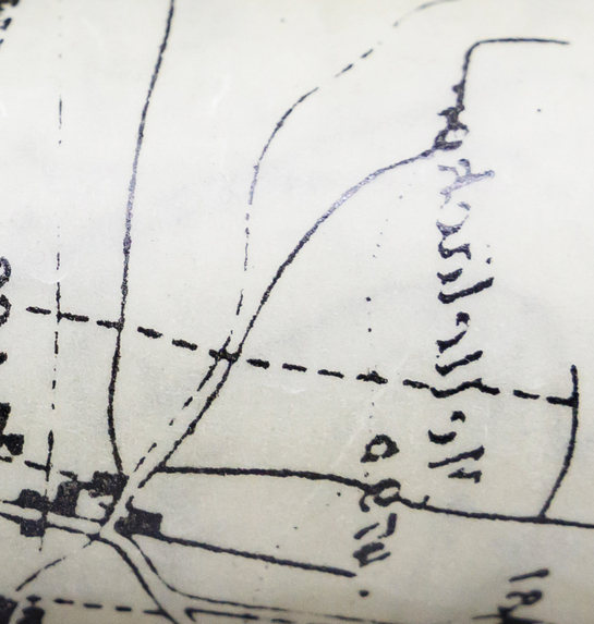 alte Stadtpläne vom Kanton Solothurn übereinander gerollt